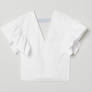 H&M Cotton blouse with a deep V-neck front and back light blue strap